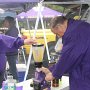 Roger (right) making margaritas using his 'infamous' gas-powered blender.
